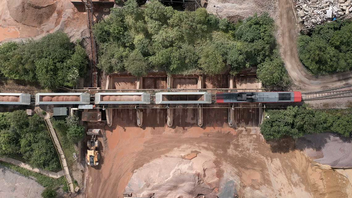 Aerial drone shot of freight train construction project
