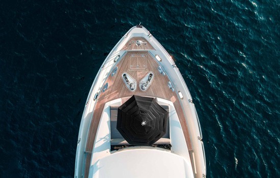 Bird's eye view of a luxury superyacht taken by drone
