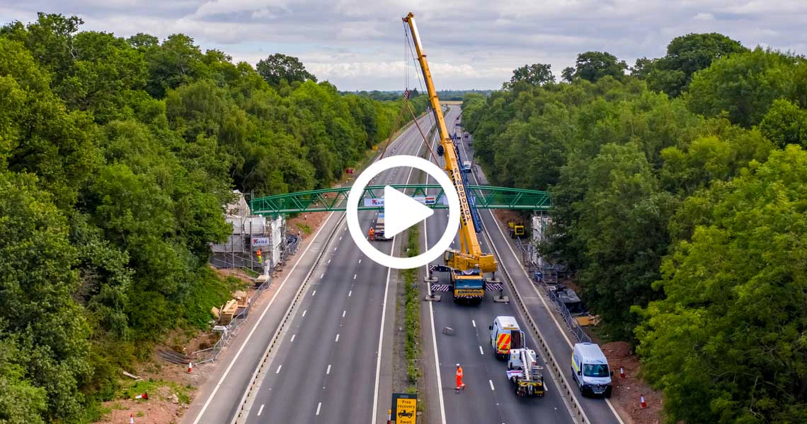 Aerial drone footage of a highway bridge installation